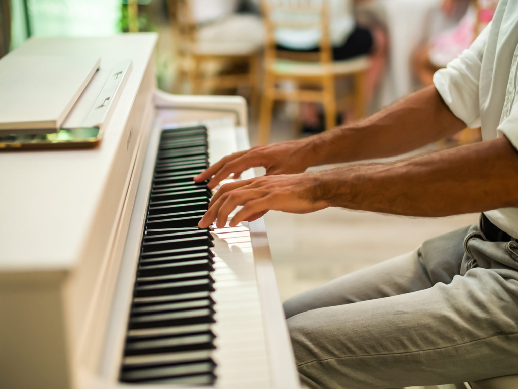 male-pianist-hands-on-grand-piano-keyboard-music-2023-11-27-05-03-45-utc